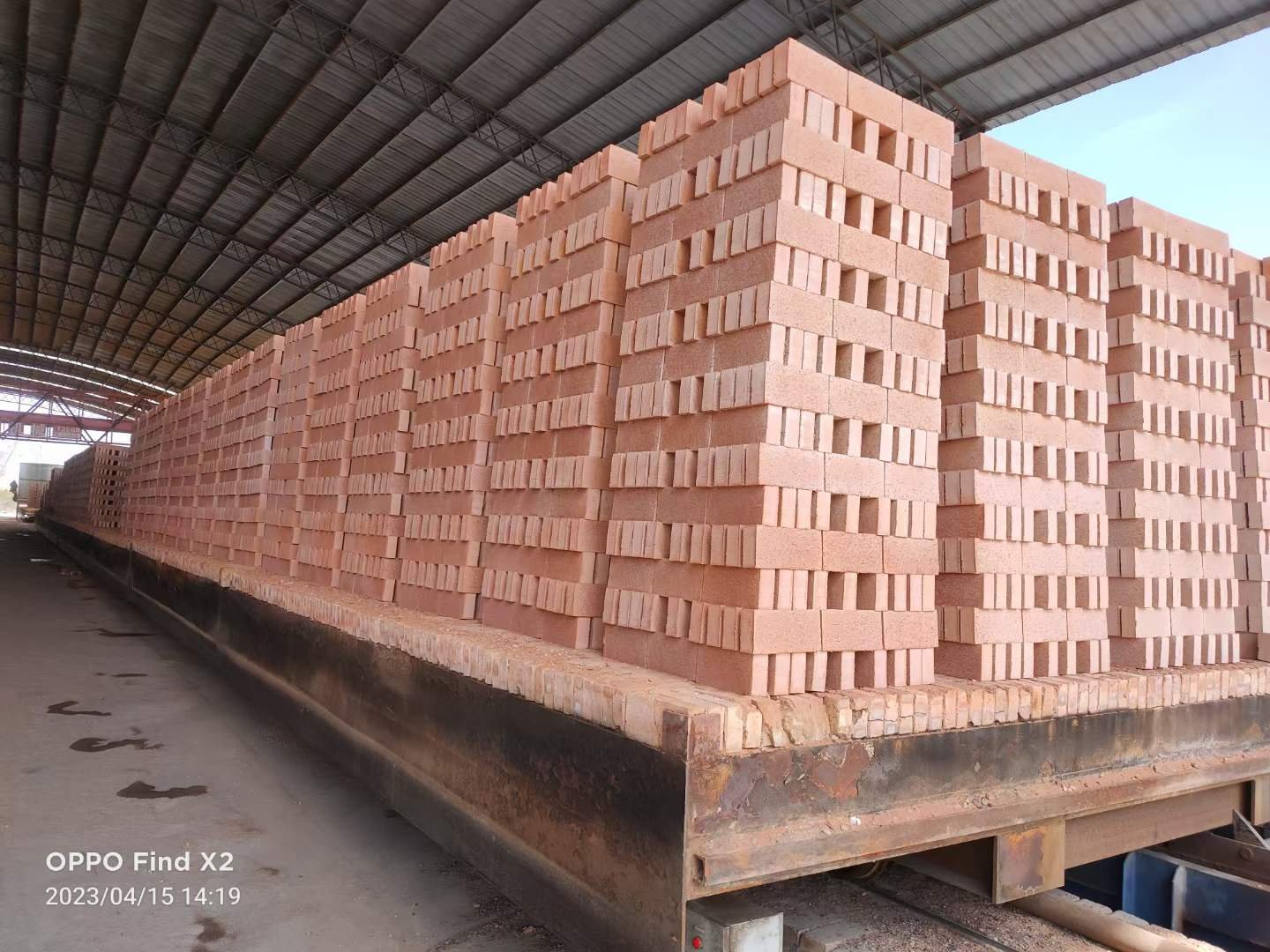 Moisture removing fan exhaust system on tunnel dryer for auto brick plant